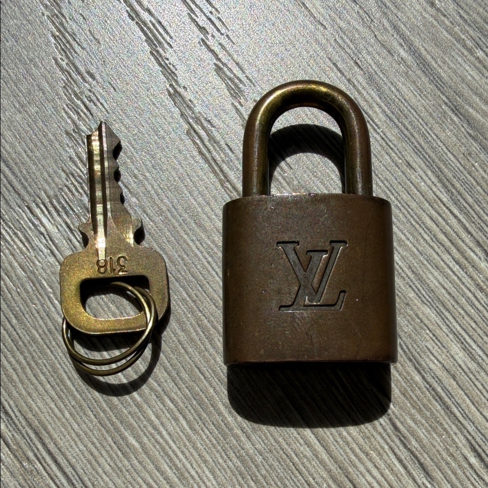 Authentic Louis Vuitton Brown Brass Padlock and Key Set